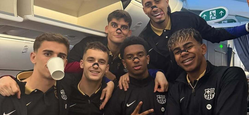FC Barcelona players wearing Gudslip nose strips while travelling